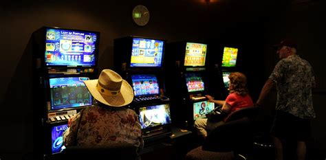 how do pokie machines work|Bright lights, big losses: how poker machines create .